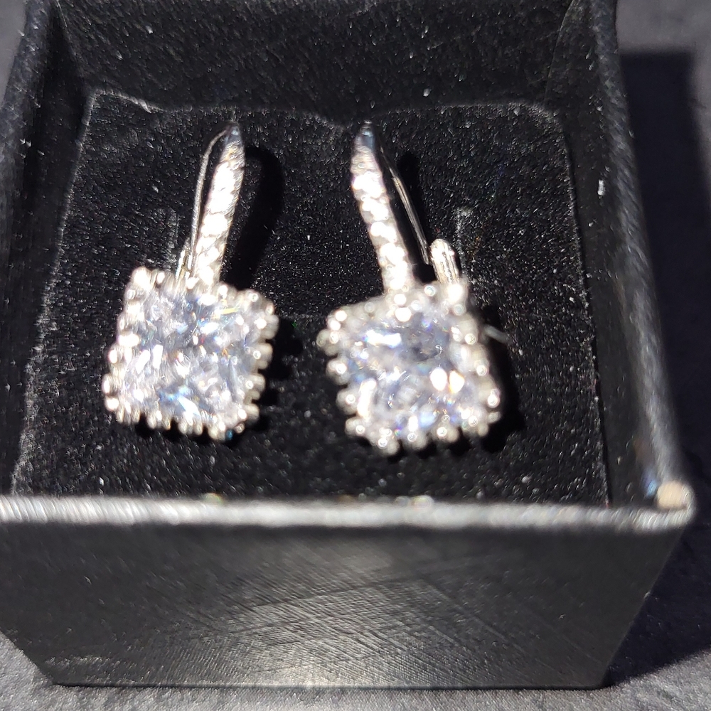 Swarovski crystal earrings, sterling silver.